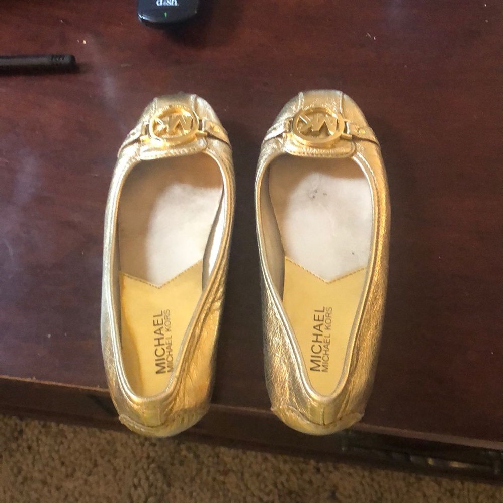Micheal Kors gold flats